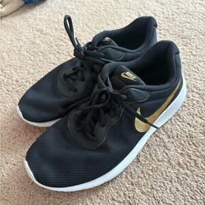 Nike Black and Gold Athletic Shoes